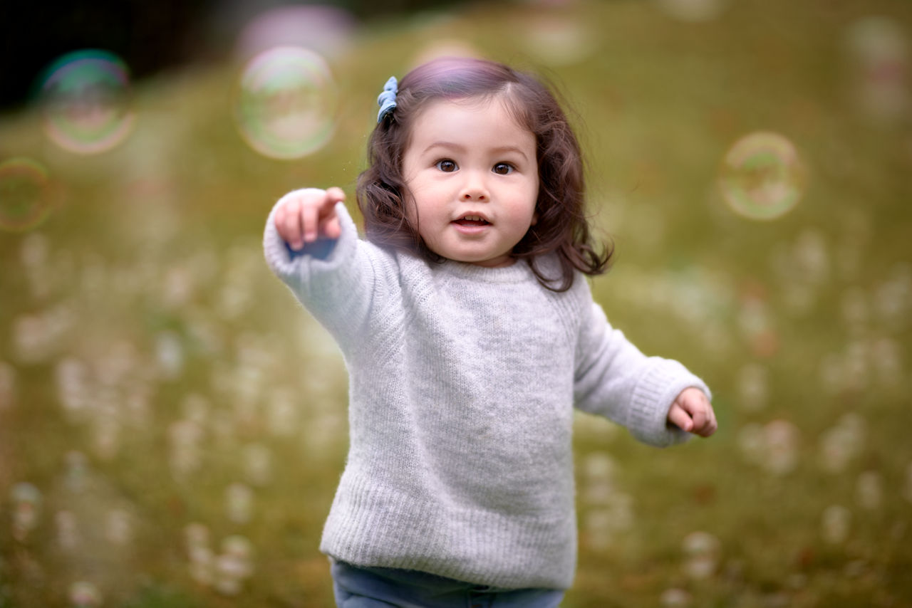 aptagro-happy-toddler-outdoors-playing