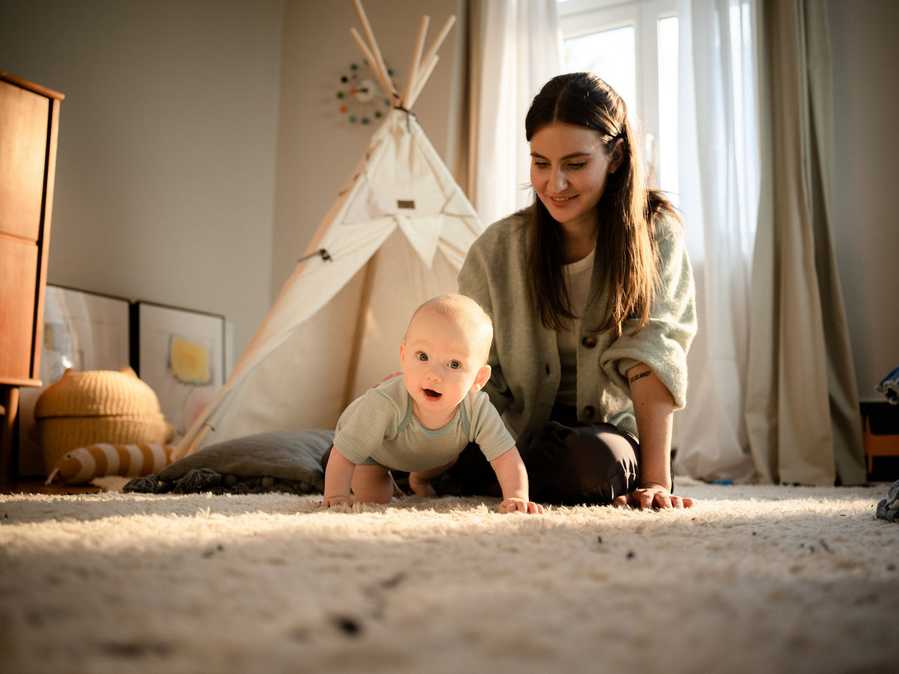 mom with crawling baby