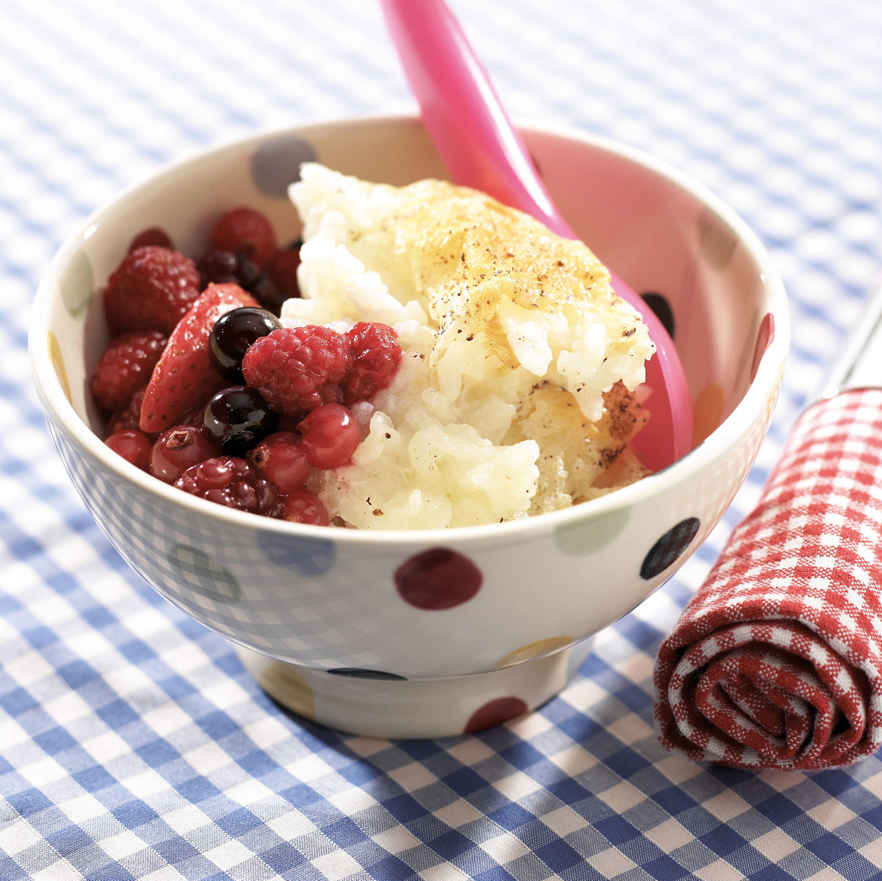 Rice pudding with fruit topping image to accompany recipe