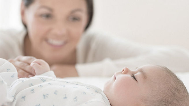 baby and smiling mum