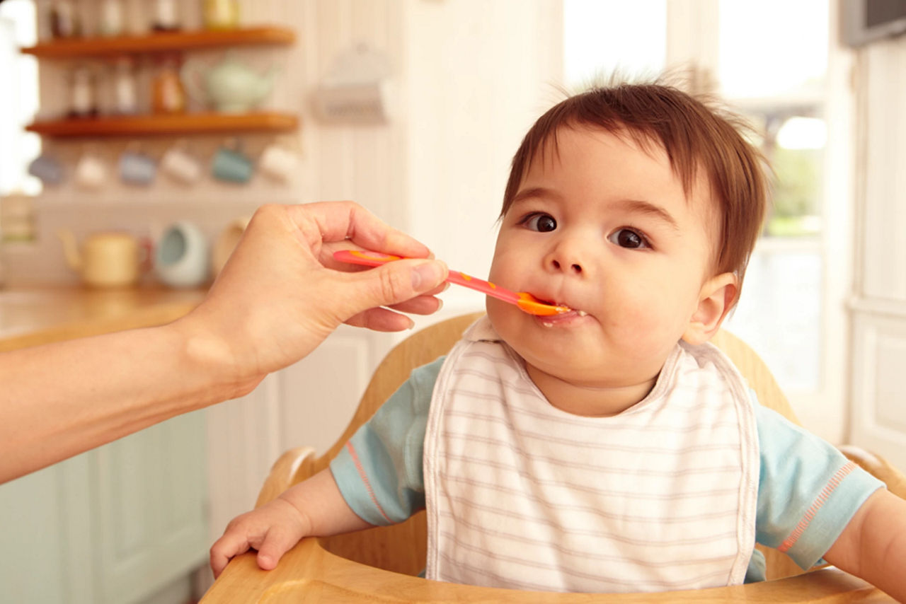 Feeding rice deals to baby