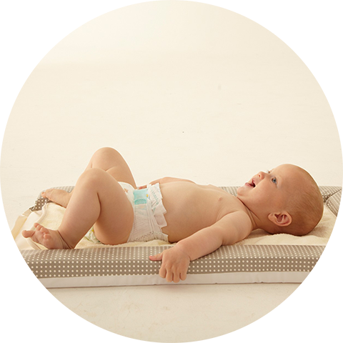 baby on changing table