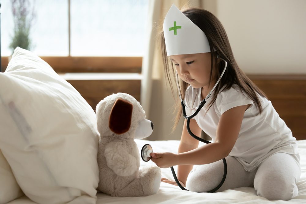 babyDoctorWithGreenCrossedHat.jpg