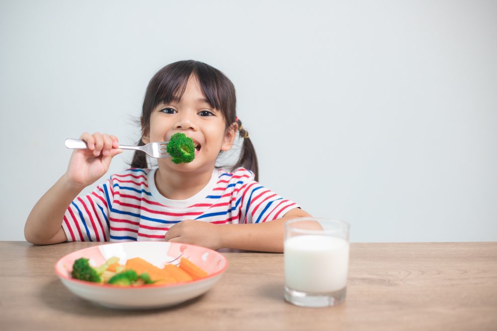 babyEatinBrocoliWithMilk.jpg