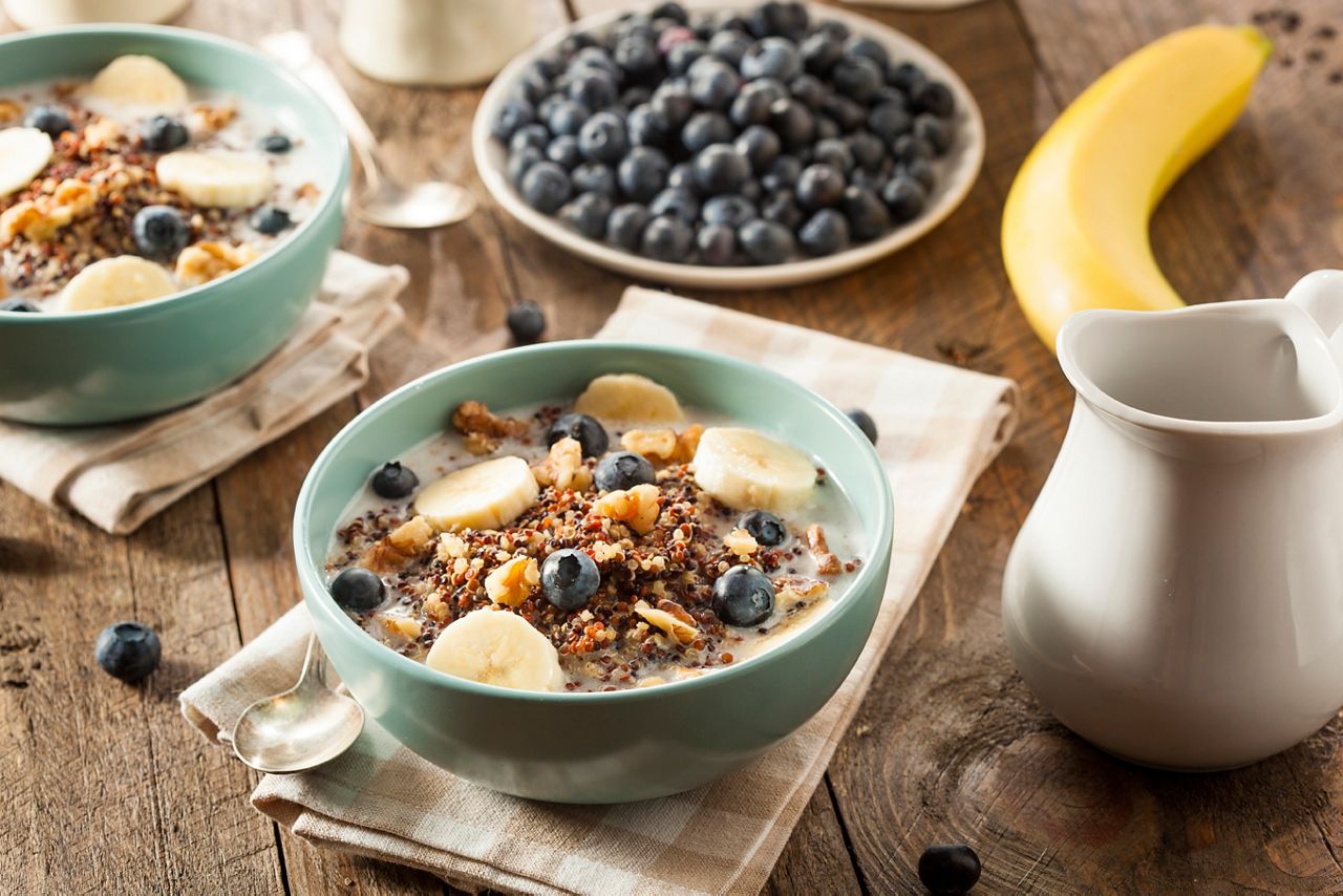 Organic Breakfast Quinoa with Nuts Milk and Berries