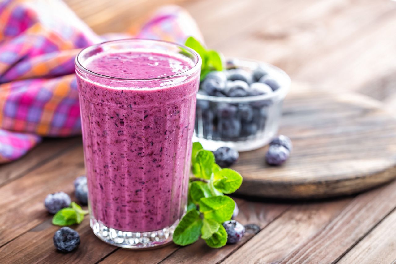 Yogurt or smoothie with fresh blueberry