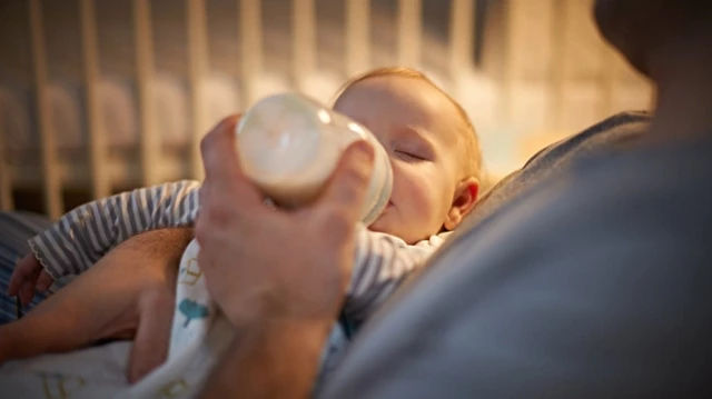 Mother breastfeeding baby