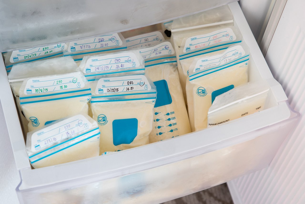 breast milk in plastic bags on refrigerator shelf, frozen mother milk  for infant, breastfeeding; Shutterstock ID 1076587919; purchase_order: DNC Thumbnails; job: Publications; client: ; other: 