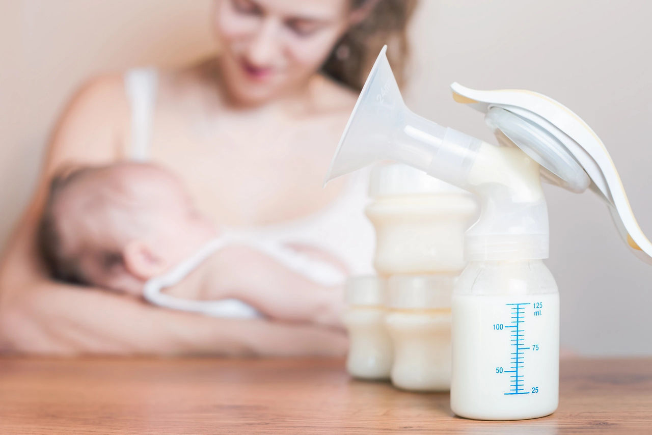 Mother breastfeeding baby