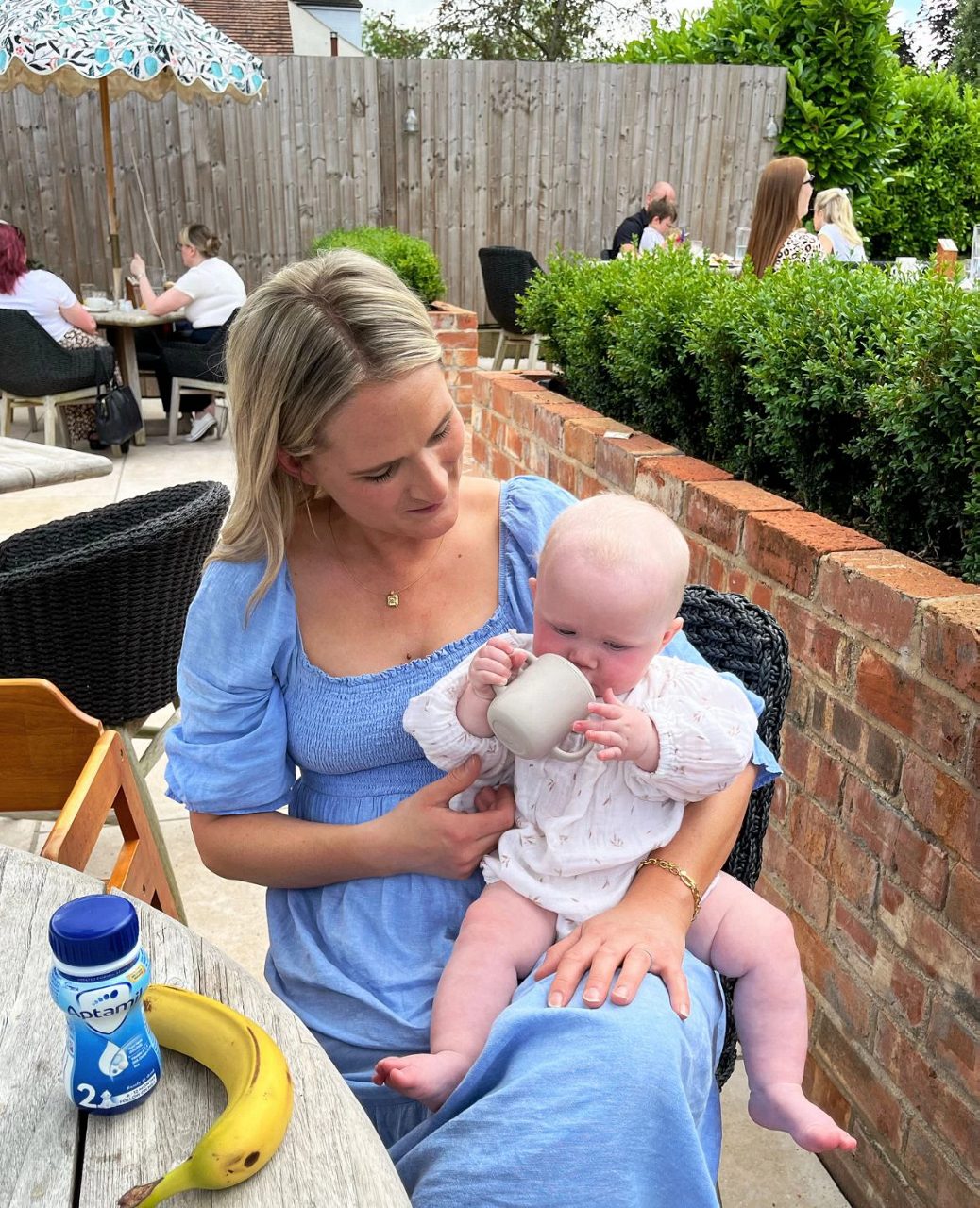 mum holding baby