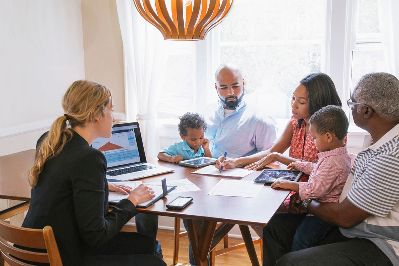 Financial advisor talking to clients