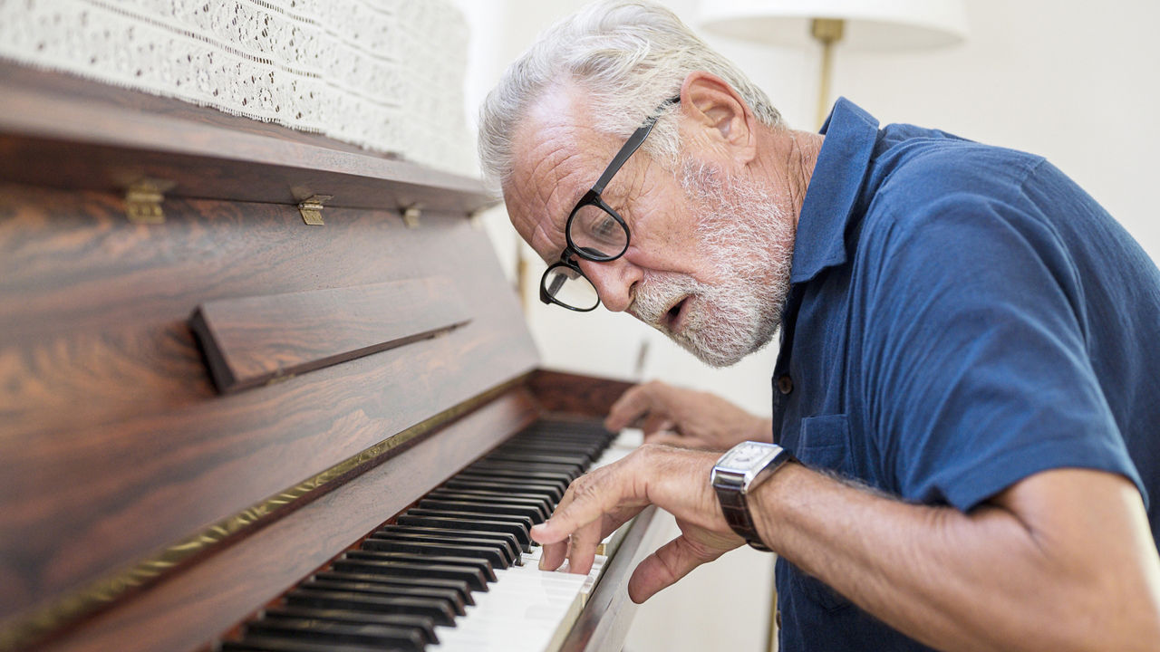 covid-19-elderly-man-piano.jpg