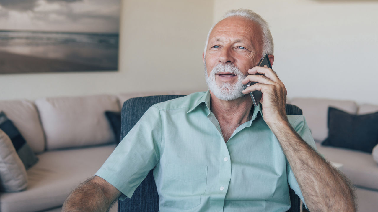 covid-19-elderly-man-telephone.jpg