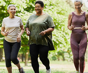 A group of women exercising in nature 