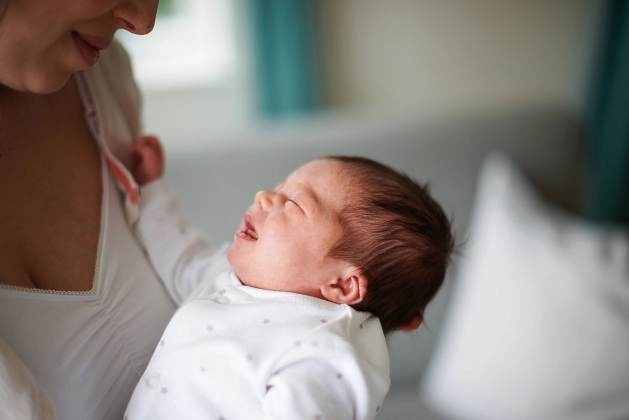 mom breastfeeding baby