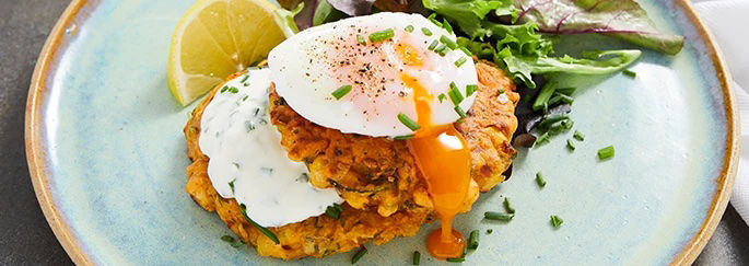 Corn courgette breakfast fritters poached egg