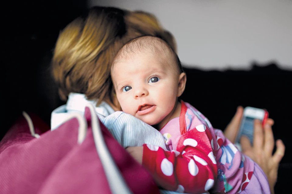 Mom holding baby