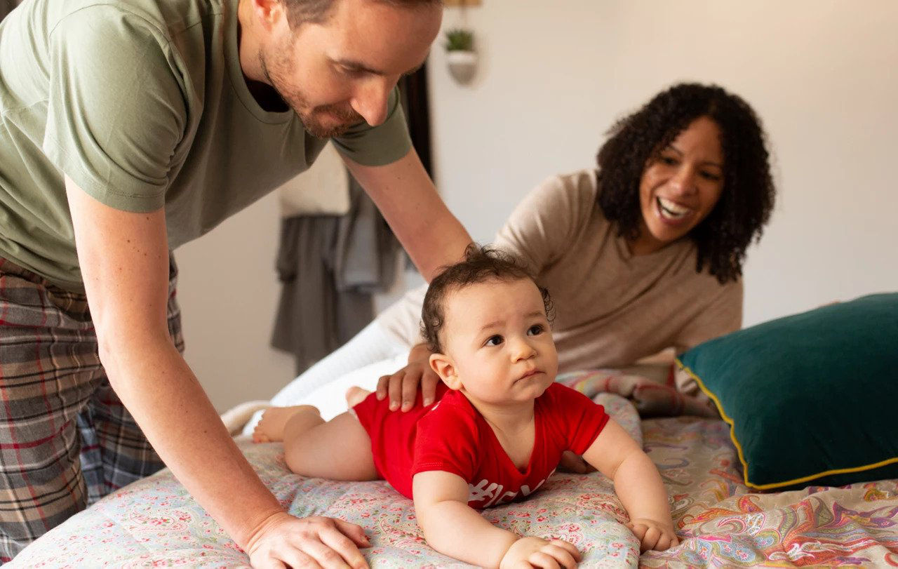 Baby with mum and dad