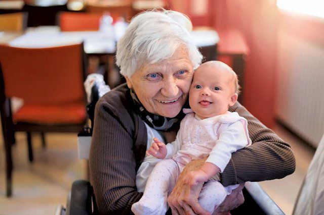 Mum and baby on bed