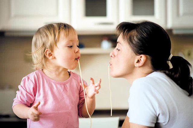 Baby and mom eating