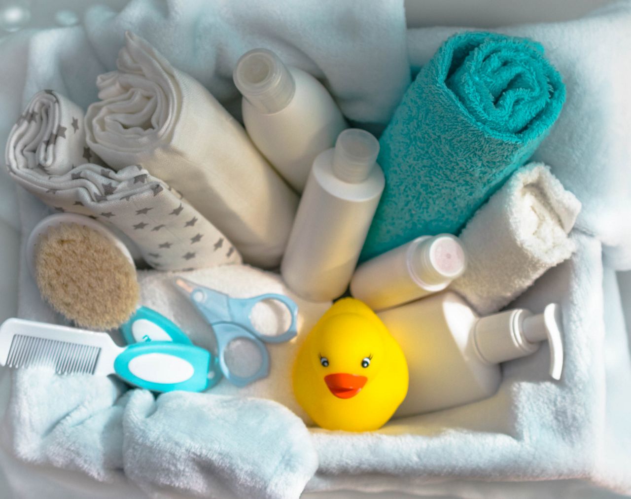 Baby accessories for bathing and hygiene with rubber duck