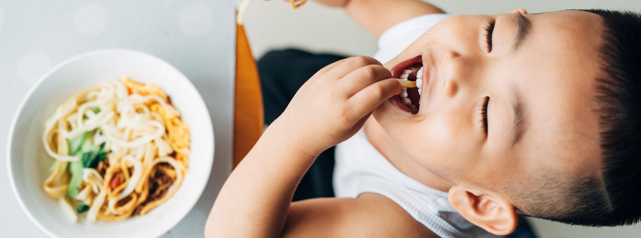 Toddler eating food