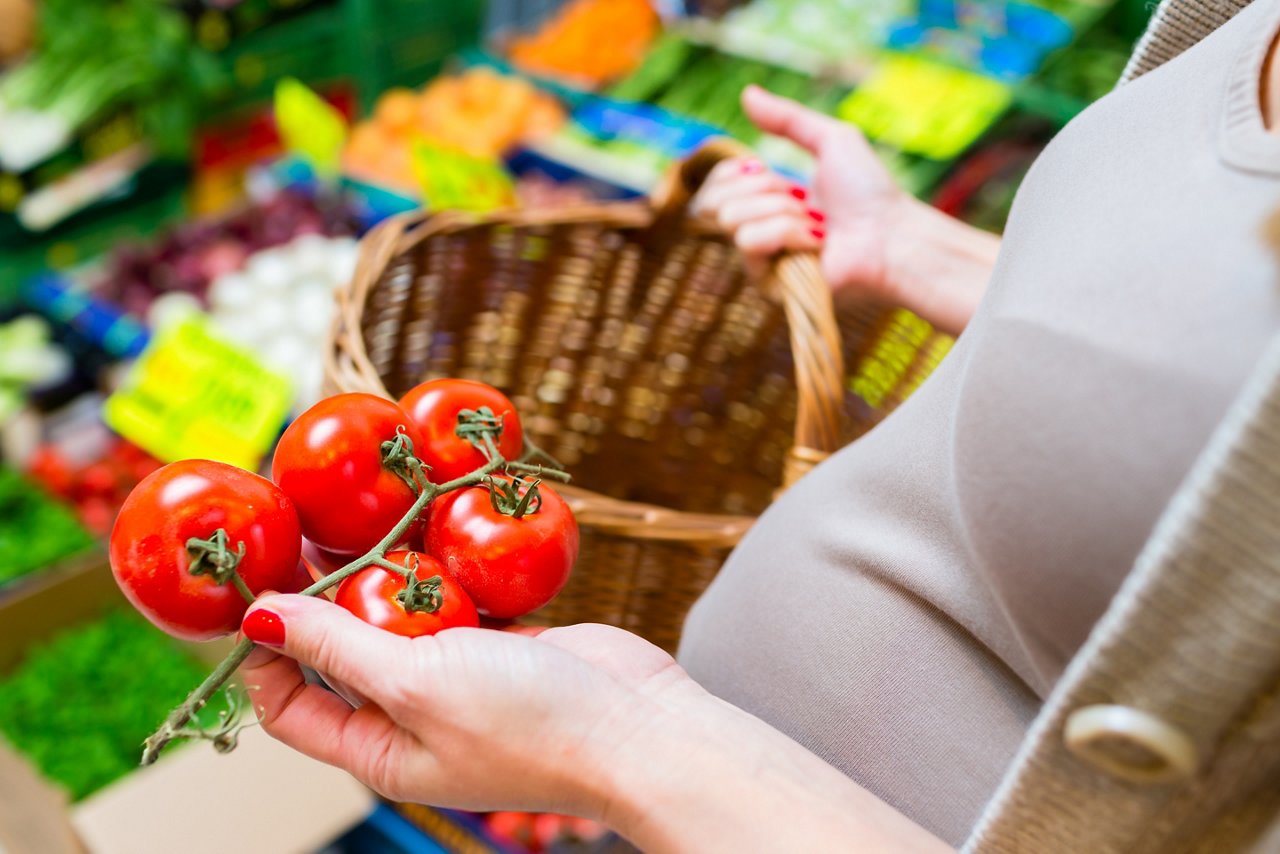 Woman shopping groceries on famers market getty images 683332996