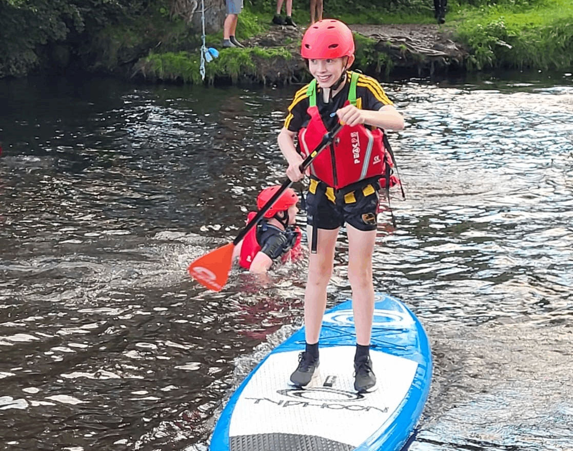 Sean enjoys paddleboarding