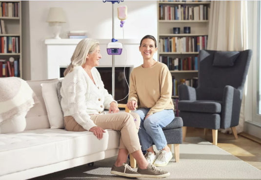 paciente y cuidadora