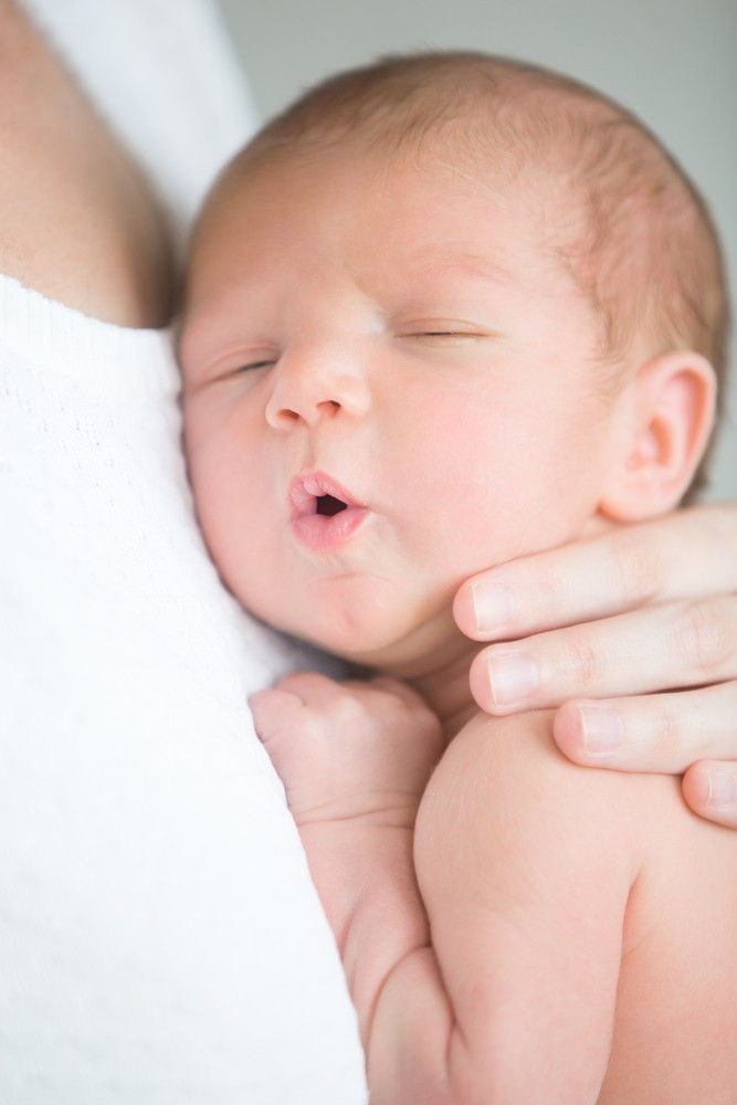 keeping-baby-awake-while-breast-feeding-ss-504248578