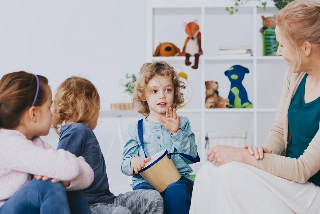 parent and children in living room