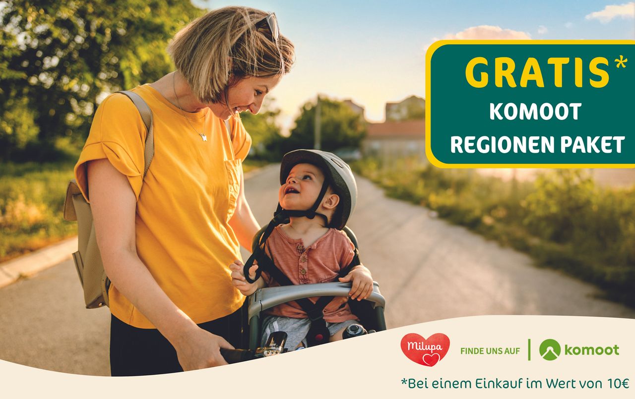 Mutter und Kleinkind auf dem Fahrrad Gratis Komoot Regionen Paket 