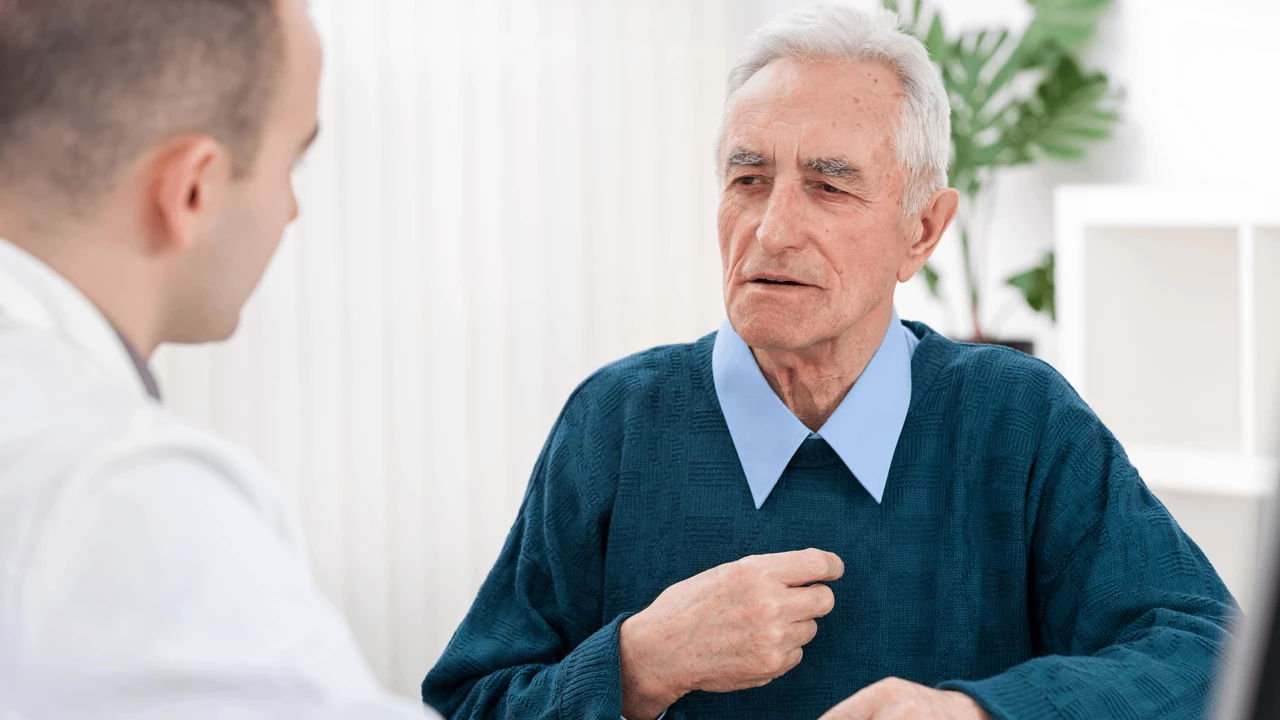 Male doctor talking with a patient