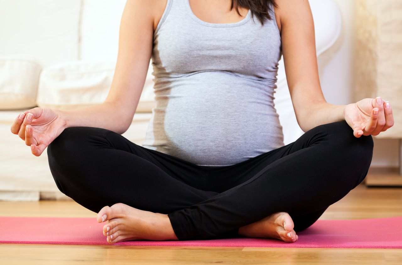 Horizontal view of a meditation during pregnancy; Shutterstock ID 222615184,meditation during pregnancy