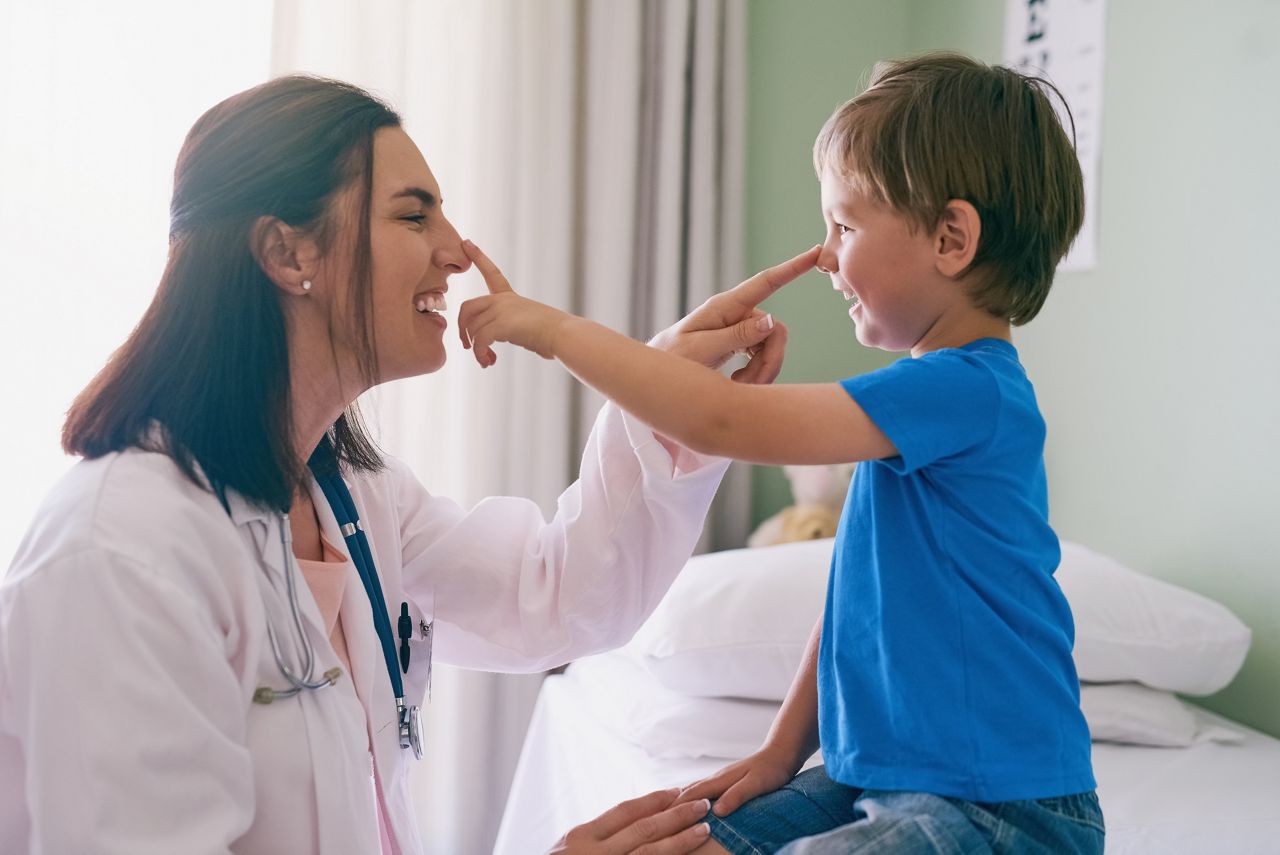 Shot of a little boy visiting the doctor