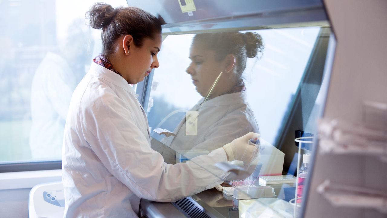 Metabolism Nutricia scientist in white coat in a lab