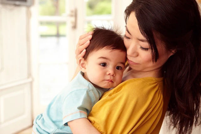 Baby in mother's hands