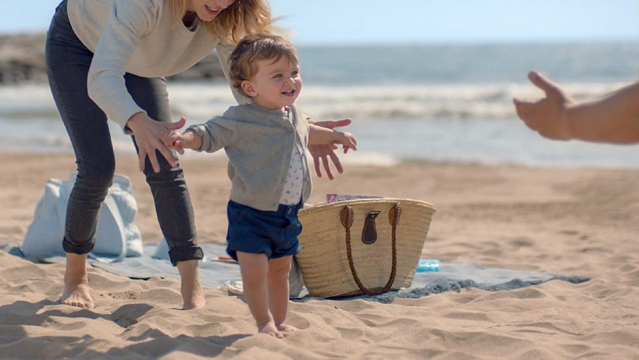 Mother with kid at the beach