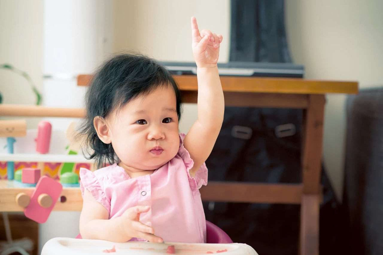 Baby in pink dress