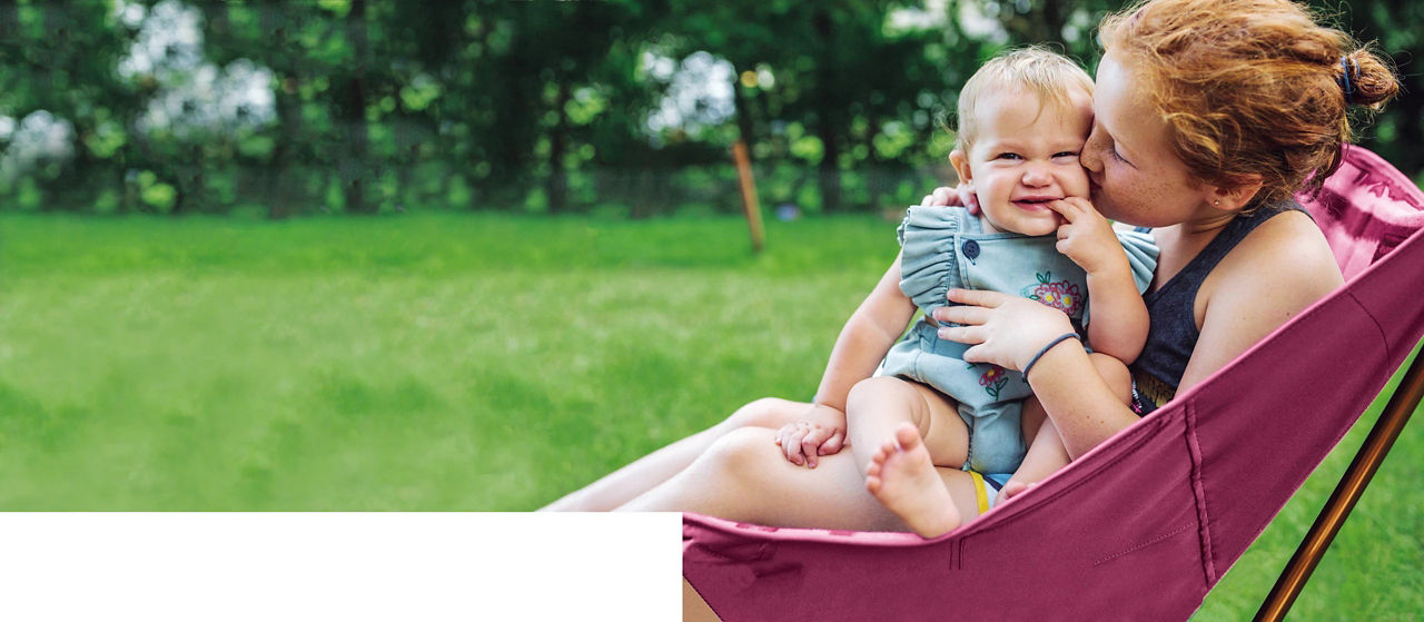 Mum baby in hammock outside