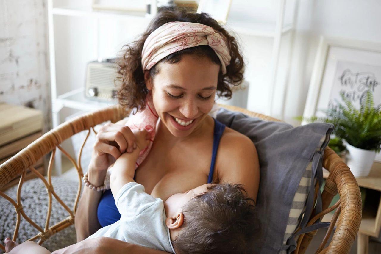 mother-breastfeeding-at-home-v1