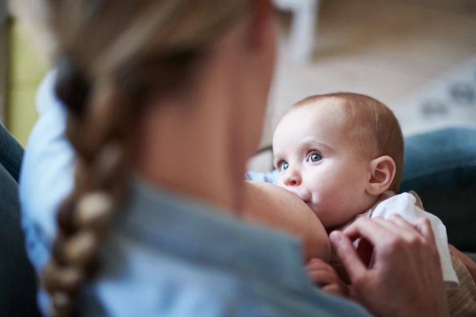 mother breastfeeding baby