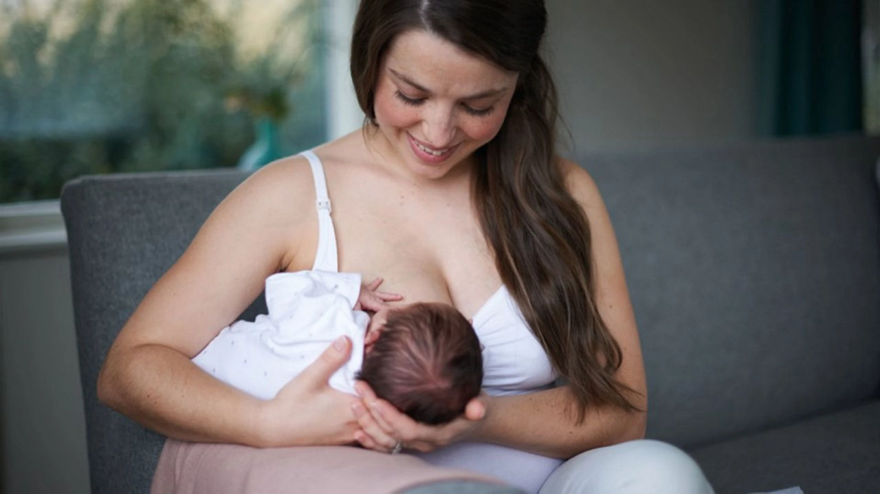 Mother winding baby