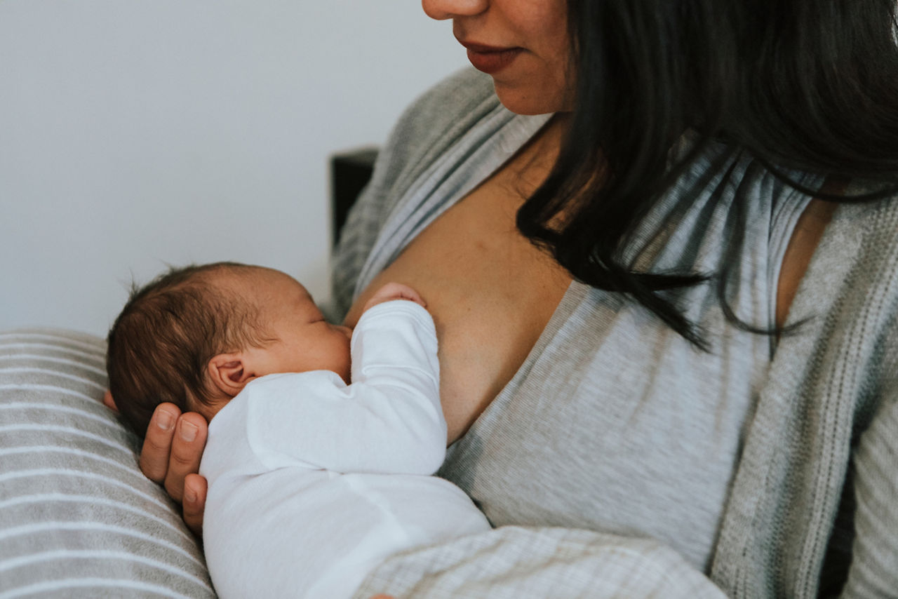 Mother breastfeeding her baby