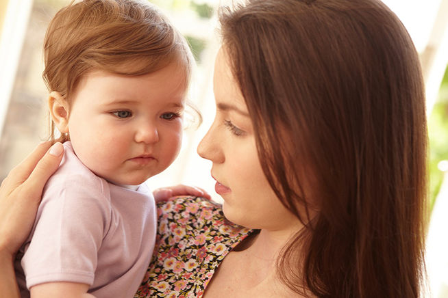 mother looking at baby