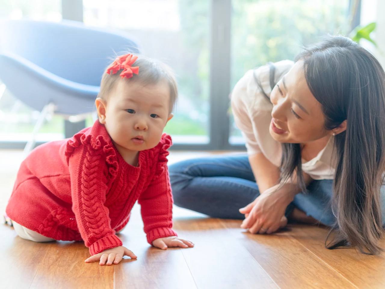 mother-playing-with-baby-new
