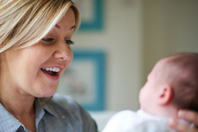 mother smiling at baby 1