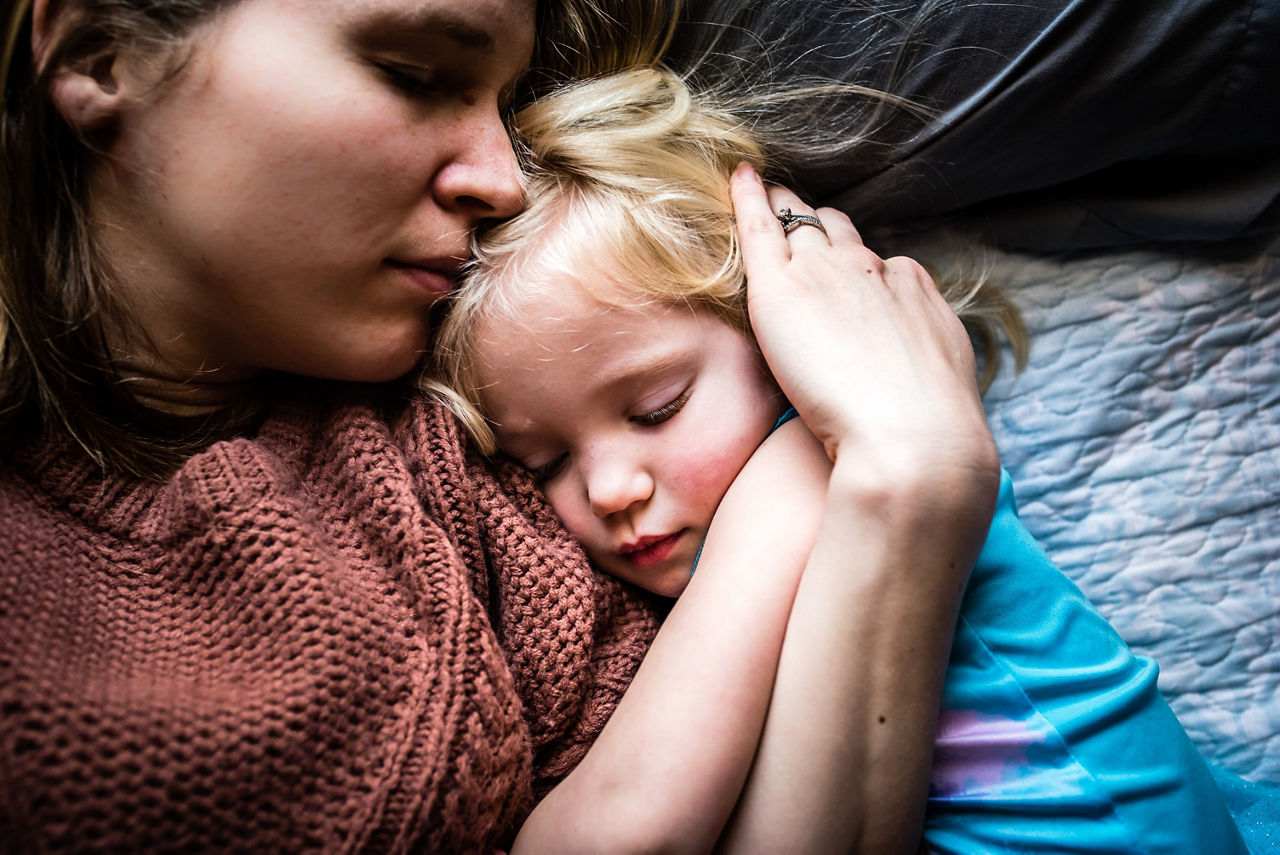 mother-with-sleeping-toddler-1