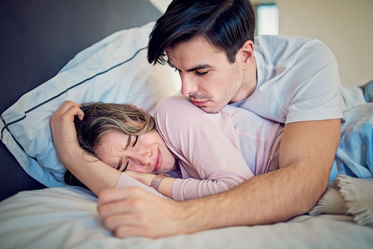 Man is trying to calm his crying girlfriend