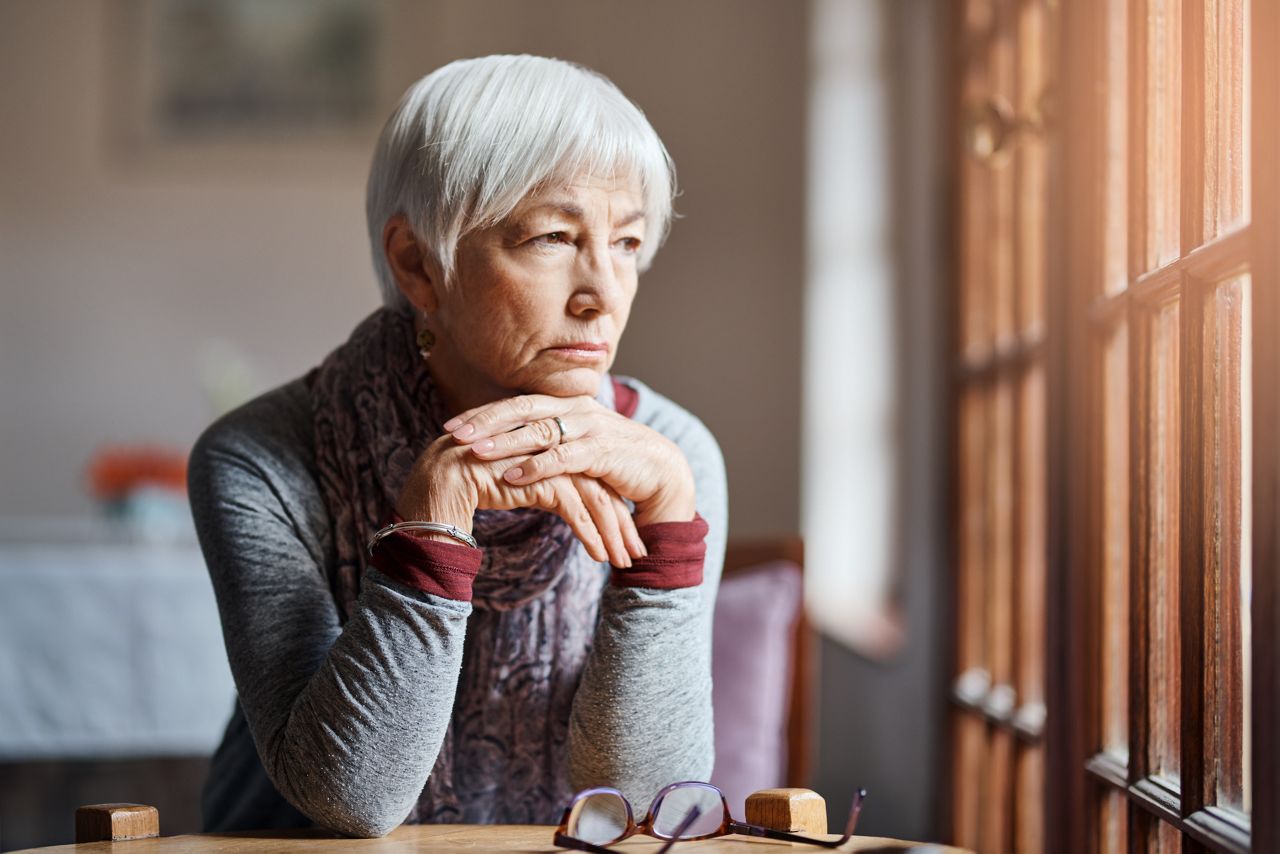 Shot of a senior woman looking thoughtful in a retirement home